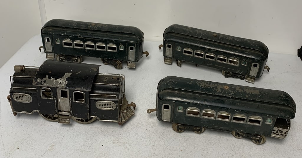 Lionel engine and three cars: untested; shows wear with scratches and paint loss,has been repainted