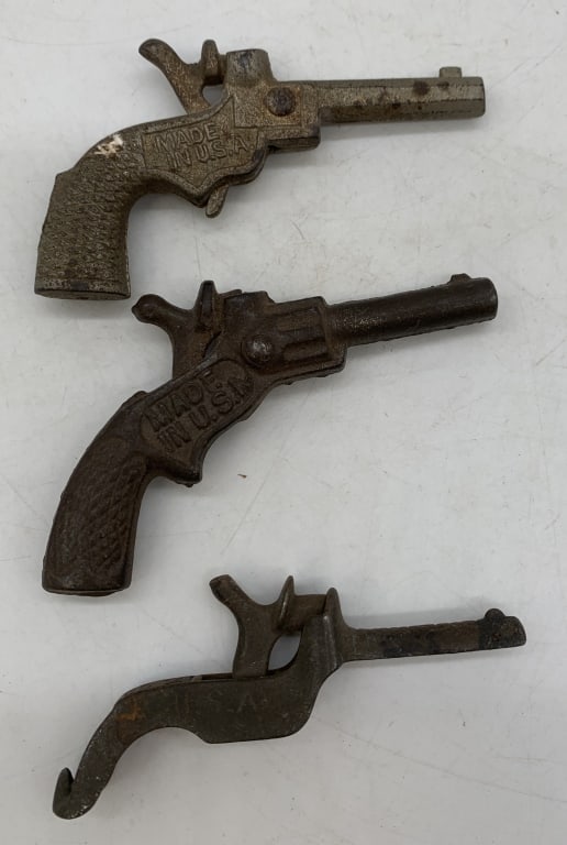 3 mini cast iron cap guns (1 of 2)