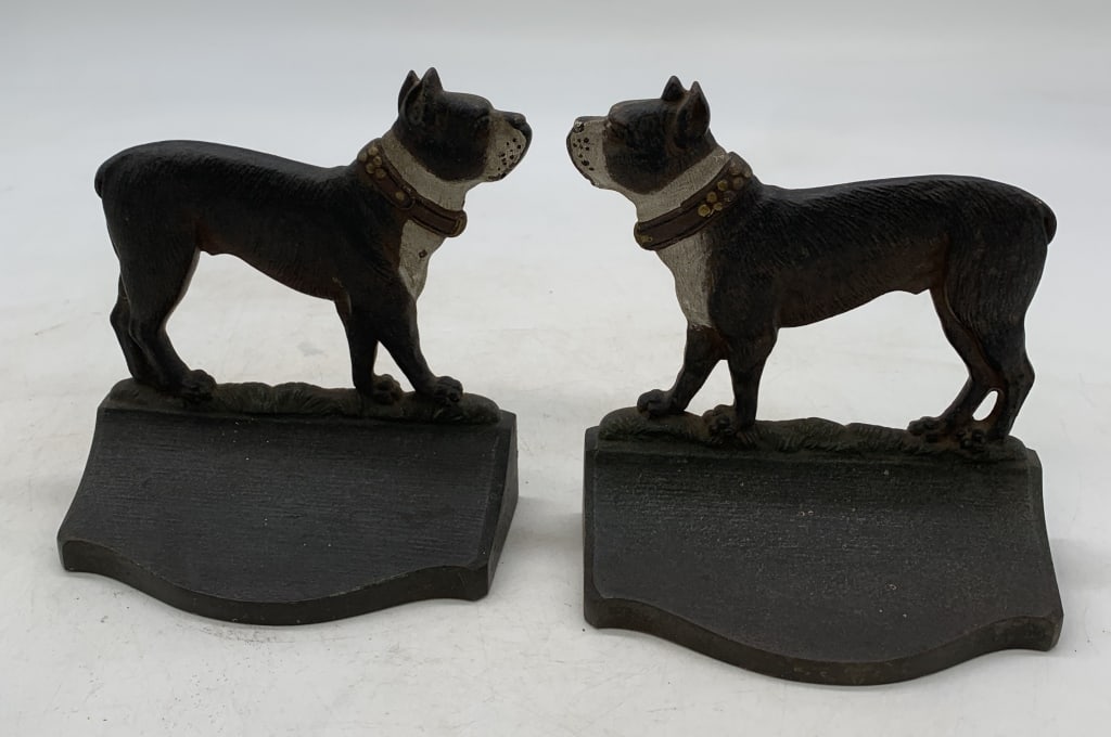 Bradley & Hubbard Boston Terrier bookends: show wear with some scratches and paint loss; felt on base is deteriorating