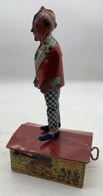 Jazzbo Jim " The Dancer on the Roof" tin wind-up