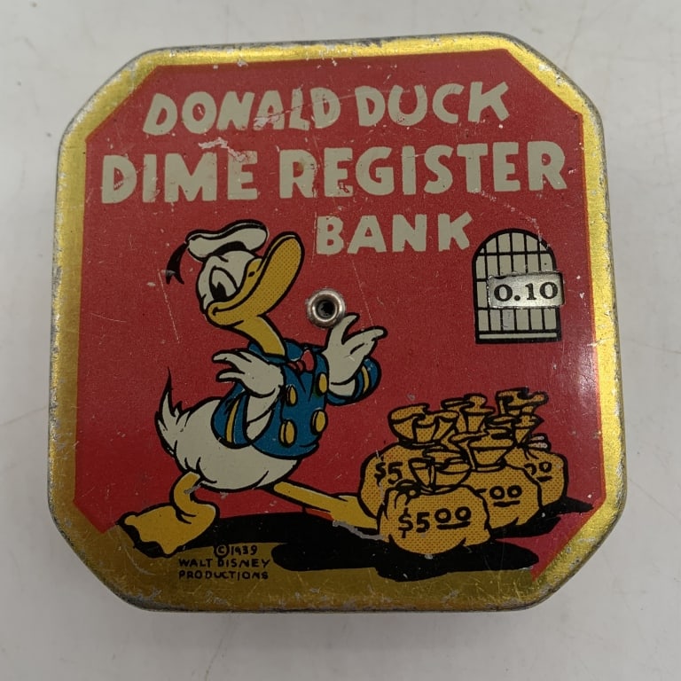 Donald Duck Dime Register Bank: has scratches and some paint loss
