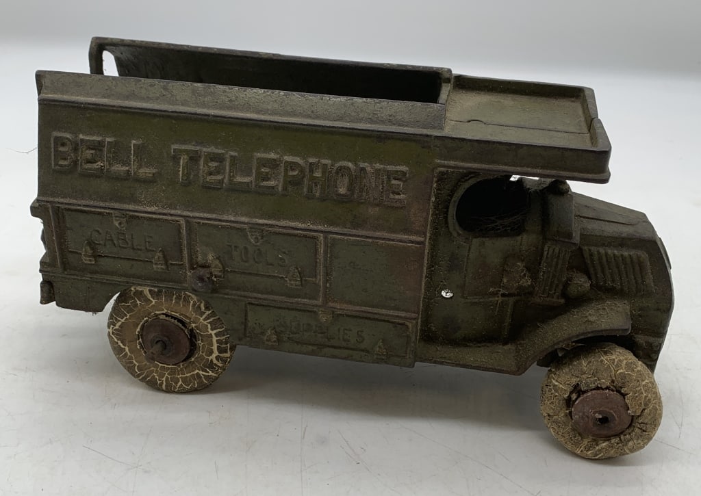 cast iron Bell Telephone Truck: has wear with scratches and paint loss, tires are damaged and accessories missing