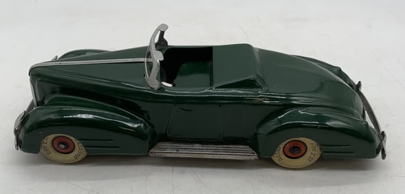 Pressed steel green convertible car