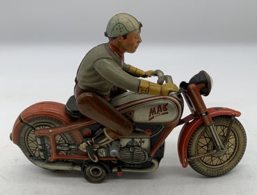 Arnold Mac 700 tin litho wind-up toy