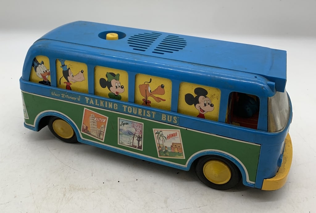 Japanese Walt Disney Talking Tour Bus: has wear with scratches, missing battery cover; friction drive not strong enough to move bus