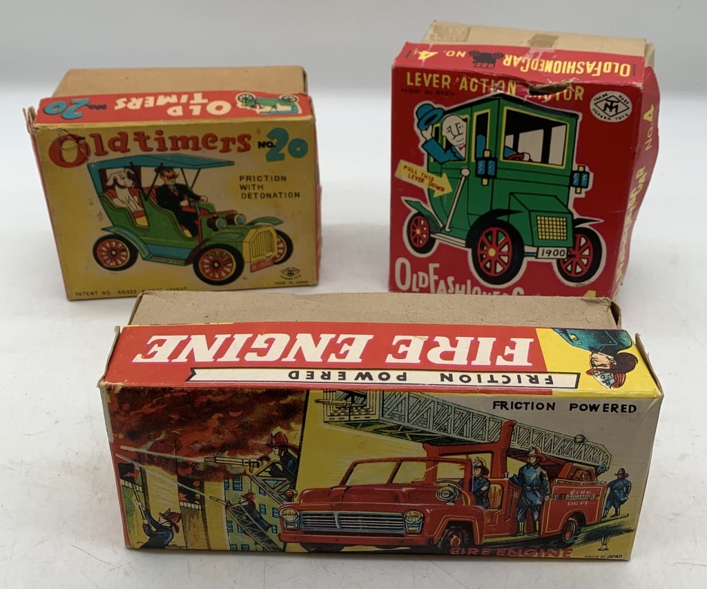 Japanese tin friction & lever action toys in boxes: boxes have wear and some damage; friction ones work, lever action does not