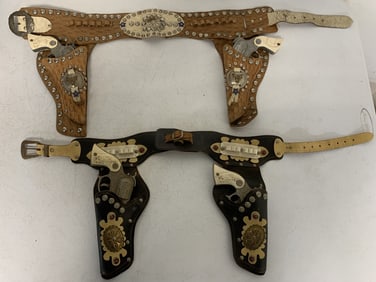 2 toy gun belts w/ guns