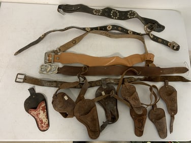 lot of children's belts and holsters