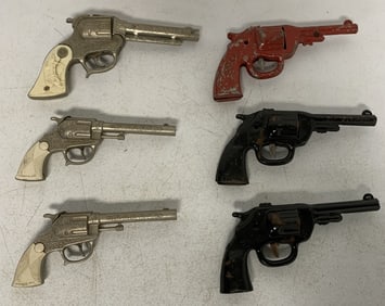 6 Wyandotte cap guns and dart guns