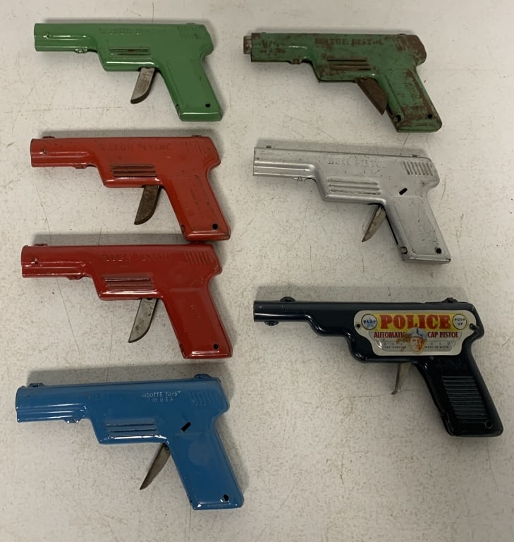 Wyandotte cap gun, water guns and bell guns: have wear with scratches, paint loss, dings and rust, one trigger broken