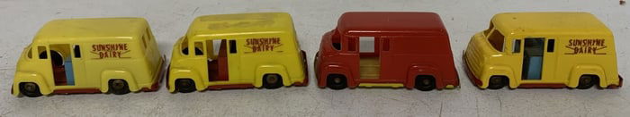 4 Wyandotte plastic friction delivery vans