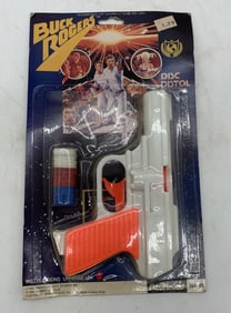 Buck Rogers Disc Pistol in package