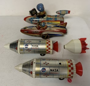 4 tin space toys; battery op. and friction