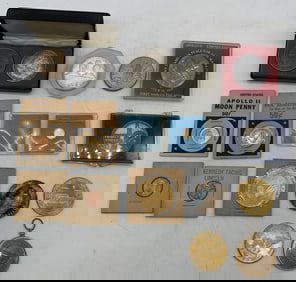 space theme coins and tokens, some silver