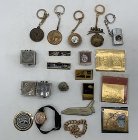 space themed keychains, stamps, pins, watch, etc.