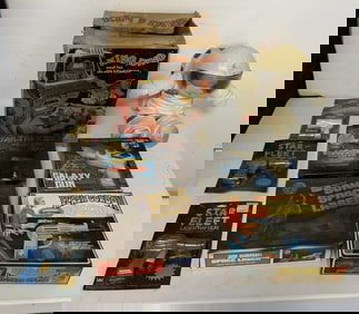 lot of damaged space toys; most in boxes