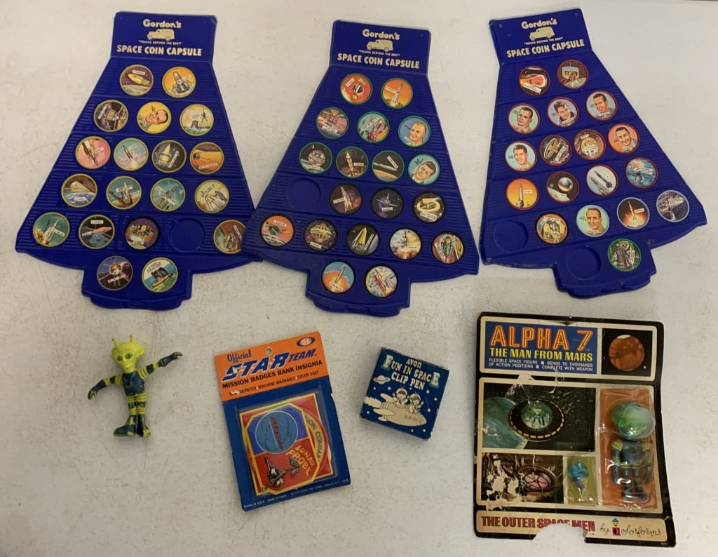space coins, figures, pen and patches: show wear and some damage