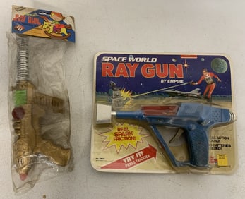 2 Space Guns in packages