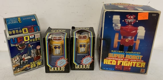 3 Robot Toys in boxes and an empty UFO box