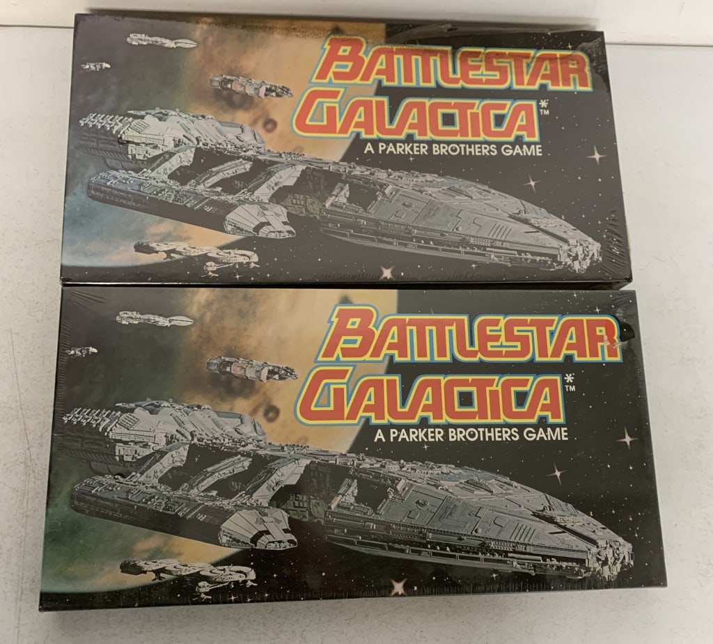 2 Parker Brothers Battlestar Gallactica games: still sealed; one has fire damage
