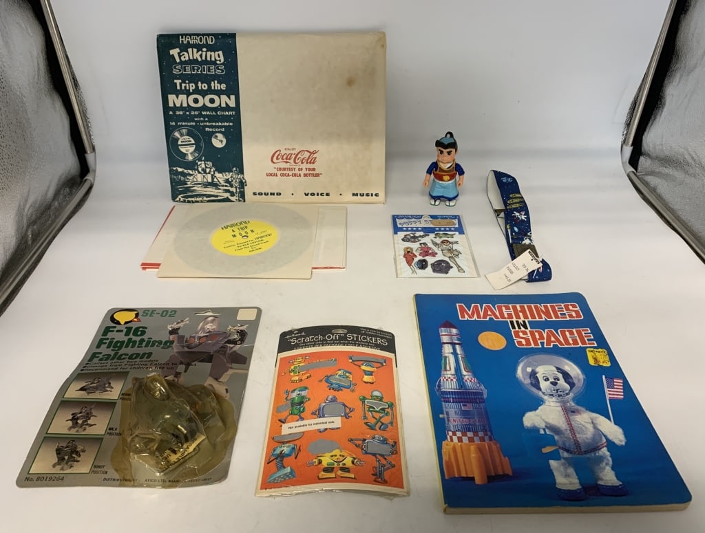 7 Stickers,Book,Coca Cola Record,Belt,Rocket: rocket has smoke damage