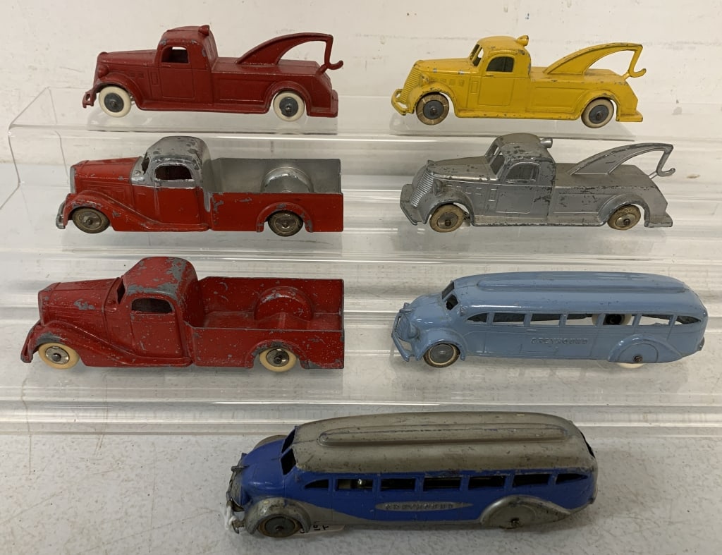 7 Tootsietoy Truck.Tow Trucks,Greyhound Bus: tire damage, scratched and worn paint throughout, metal toys