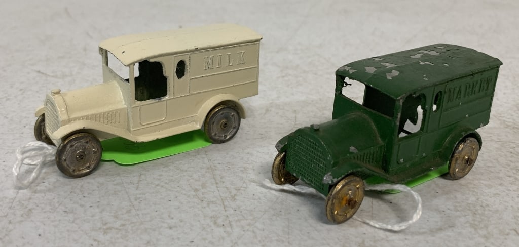2 Tootsietoy Milk & Market Trucks: chipped paint throughout, metal wheels