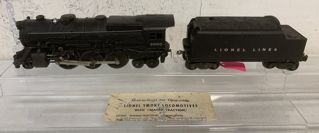 2 Lionel pcs- 2035 Locomotive/Tender & Boxes: boxes have wear and damage, untested, wear, scratches, O gauge