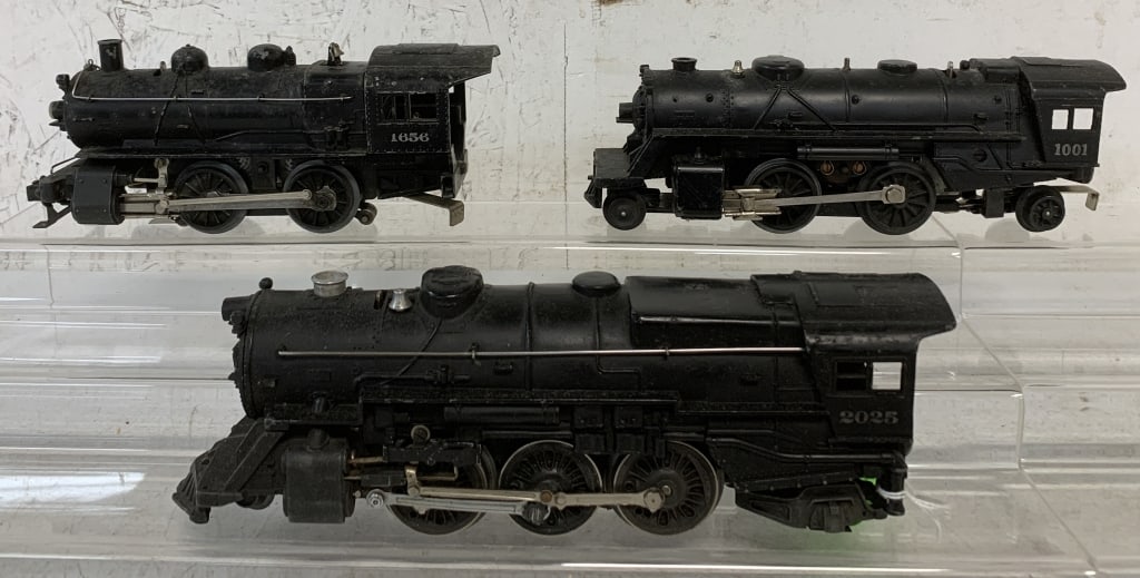 3 Lionel Locomotives/Boxes: 1656, 2025, 1101 box contains 1001 engine, untested, toys have some wear and age, boxes have age, wear, damage, 16565 does not have a box, O gauge