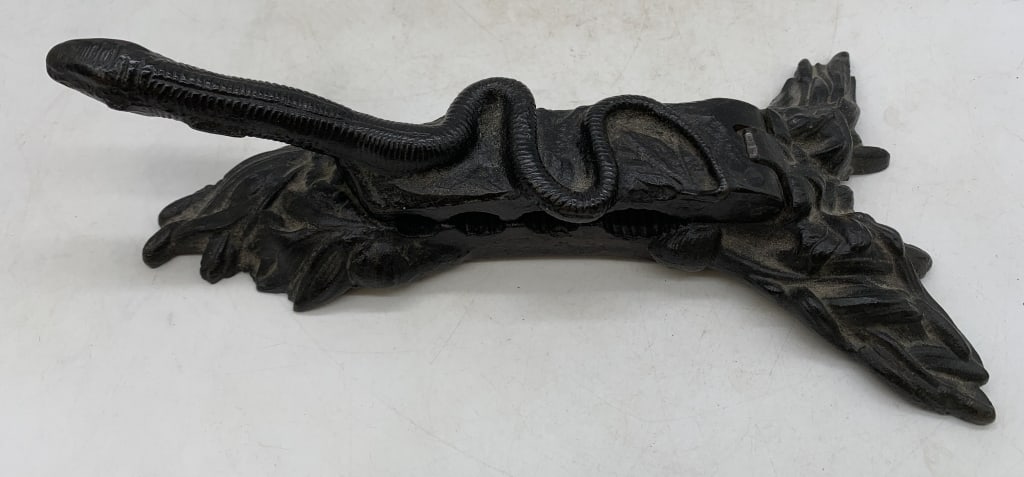 Cast Iron Snake Cork Press: wear and age, some rust on the bottom, no names or markings