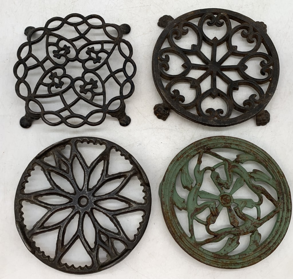 4 Cast Iron Trivets: no names or markings, some wear, some rust