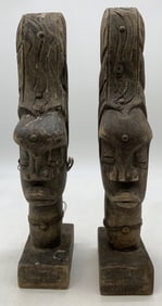 2 carved wood figurines