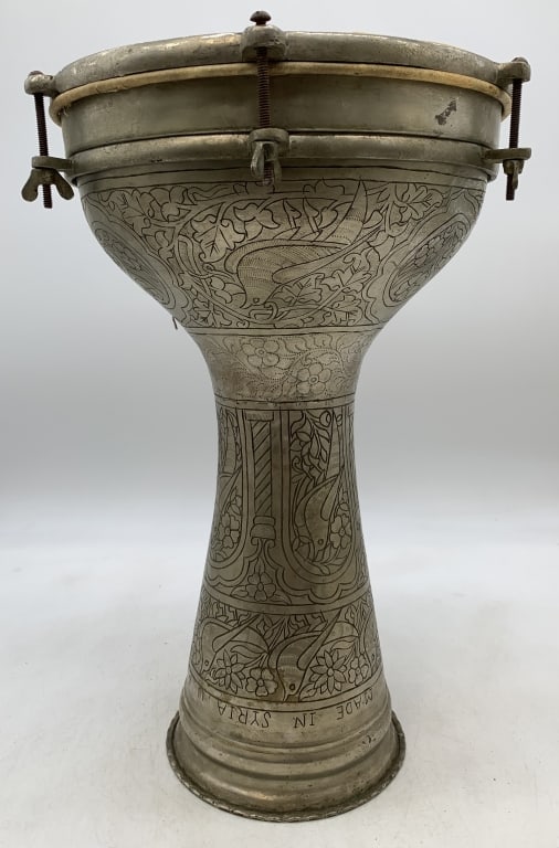 Darbuka made in Syria U. A. R.: has wear with scratches, dings and a small dent as shown