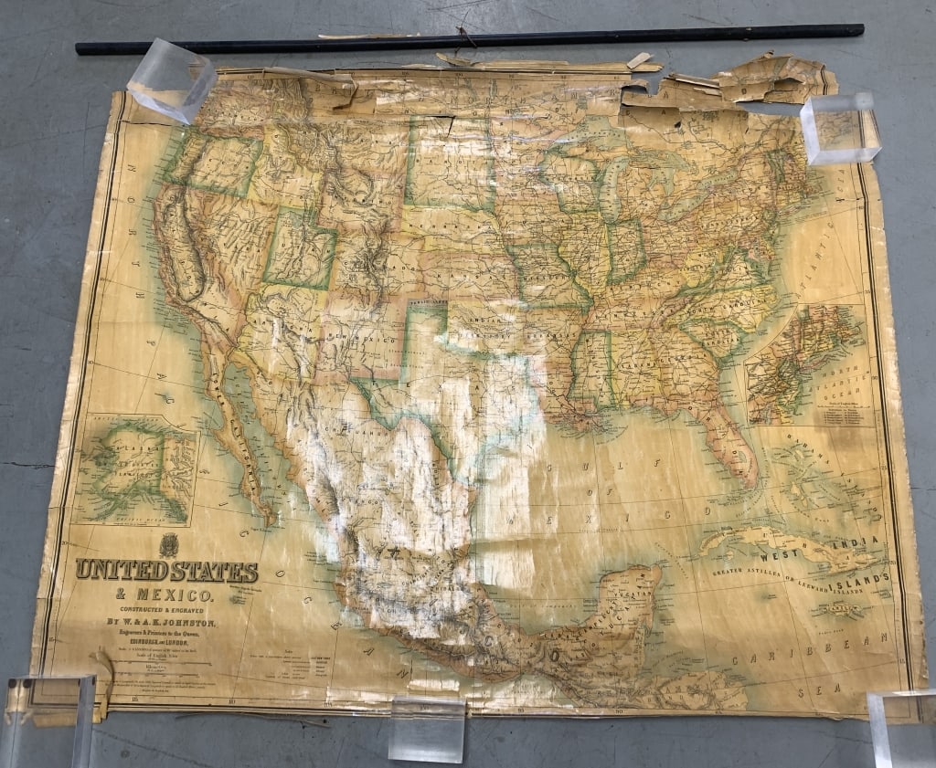 Classroom United States & Mexico Map: era unknown, lots of tears at top right hand corner, wooden piece is not attached to the top of the map anymore, wrinkles, creases, rips, 42" tall X 51" wide