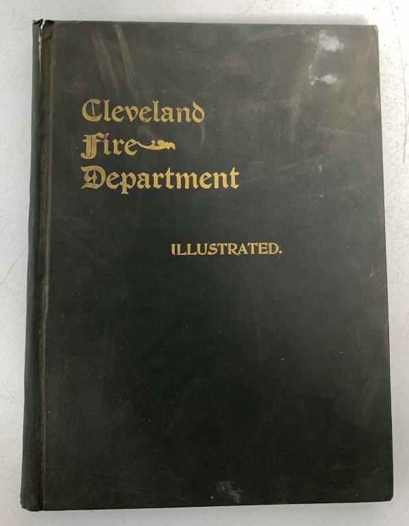 1897 Cleveland Fire Department Illustrated: has wear and damage to cover; some water damage to pages as well as age discoloration