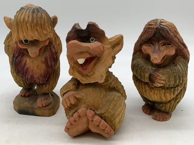 3 carved wooden trolls