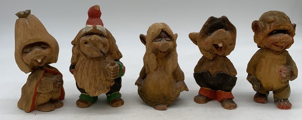5 carved wood trolls: some marked made in Norway; have wear, one has crack in foot and there is a chip to red hat