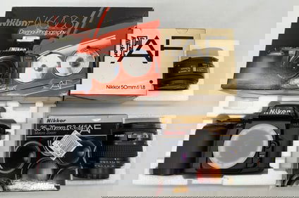 Nikon N6006 camera body and two Nikon lenses