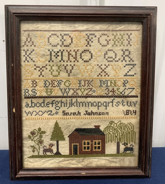framed sampler: has staining; frame has chips