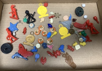 lot of charms, pins and toys