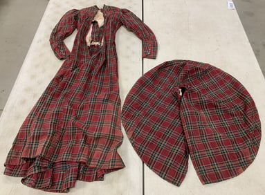 woman's plaid dress and cape