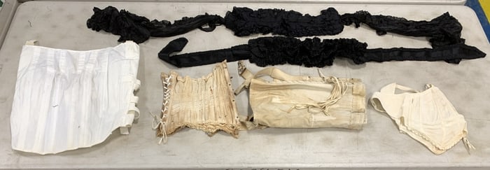 corsets and Victorian neck ruffles
