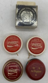 5 Yo-Yos; 3 adv. Coke, 1 Dr. Pepper