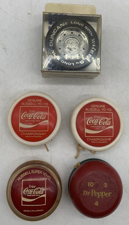 5 Yo-Yos; 3 adv. Coke, 1 Dr. Pepper: have wear and some discoloration