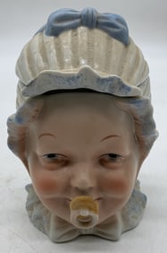 porcelain baby head jar