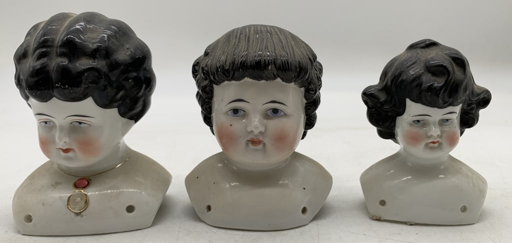 3 porcelain doll heads (1 of 5)