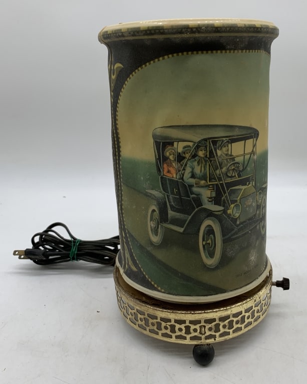 1957 Econolite motion light: untested; has wear with some warpage to plastic and finish lost and rust to metal