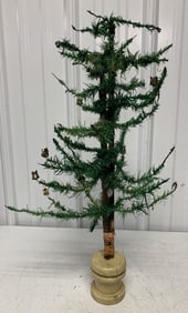 feather tree with some candle holders