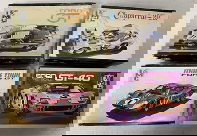 4 vintage IMC car models in boxes