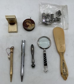 tape measure, cufflinks, pencils, magnifier, etc.